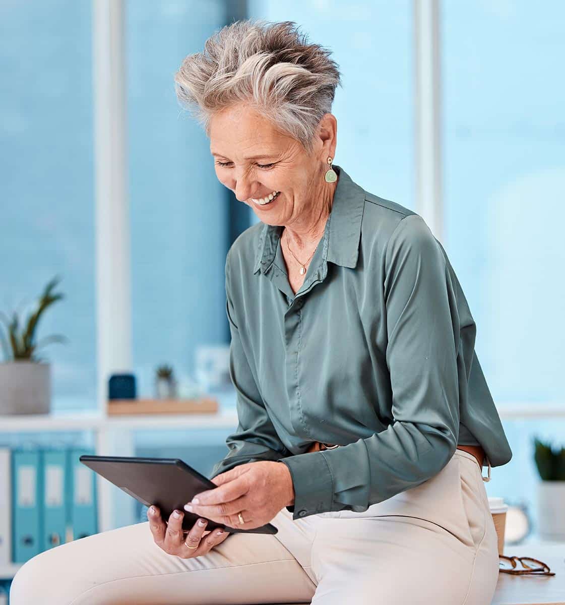 Woman Reading a Tablet Computer