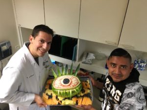 Andrew Schimel helps patient with Atypical Macular Degeneration and gets a work of art in return!