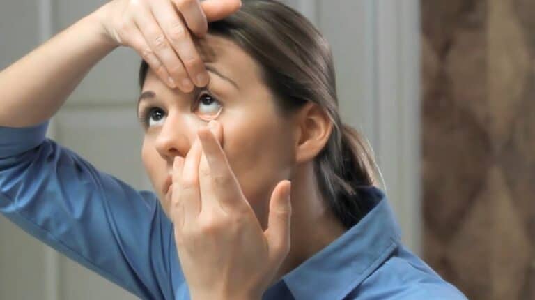 Woman Inserting a Contact Lens