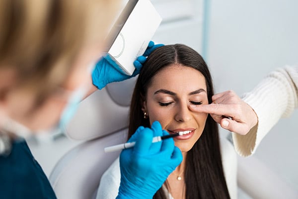 Woman being prepped for cosmetic surgery